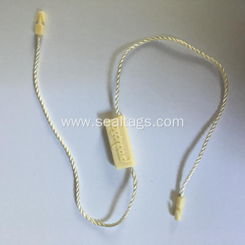 Plastic tags with string together paper tag